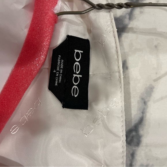 Beautiful fitted top with leather trim around neck area . - Picture 4 of 4